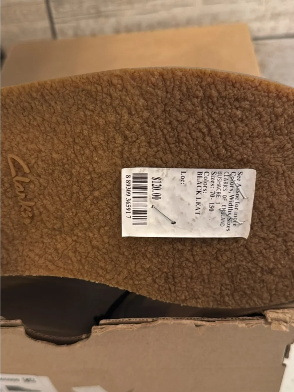 Clarks Men’s Black Leather Chukka Boots with Tan Crepe Sole